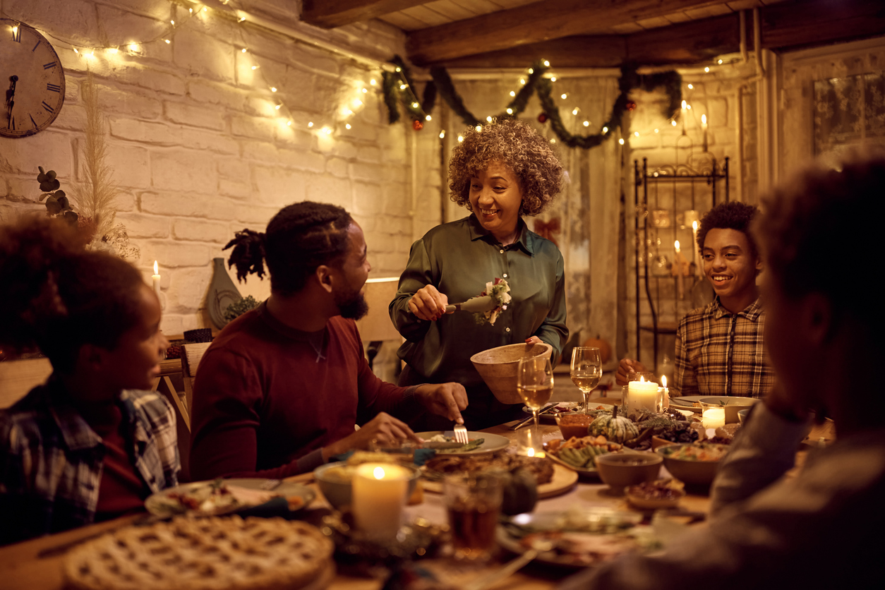Happy family eating a holiday meal together
