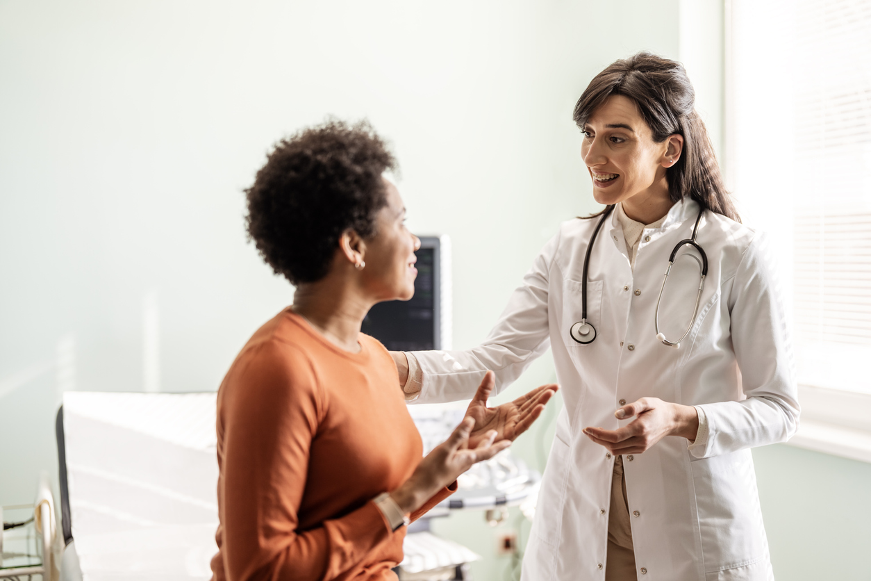 Audiologist consulting her patient.