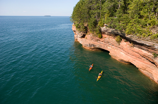 Couple sea kayaking on Lake Superior.